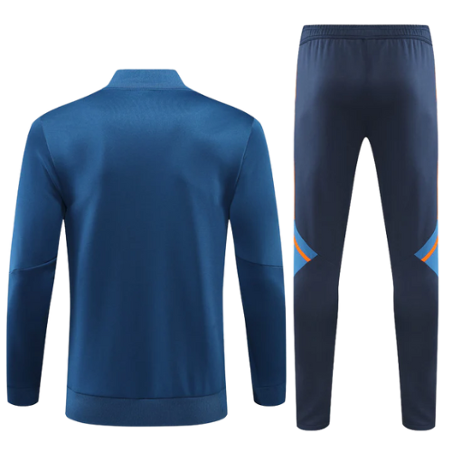 KIT VESTE BLEU ORANGE + SURVÊTEMENT MANCHESTER UNITED 2022/23